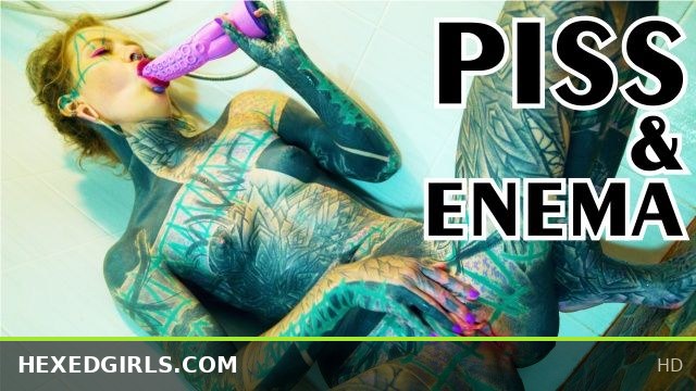 Heavily Tattooed Model Goes Deep in Wild Shower Anal Masturbation Session