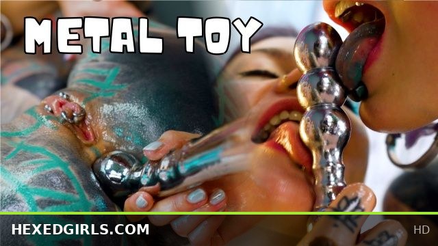 Tattooed Oiled Teen Pornstars Share Intense Metal Toy Play Session